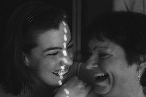 girl and woman laughing